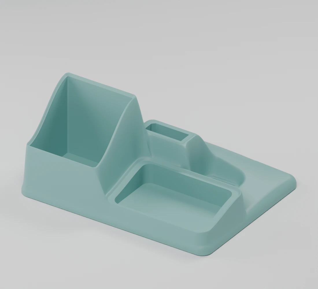 CAD close-up of the continuous sculpted base, with the taller card pocket on the left and shallow rounded player pocket on the right